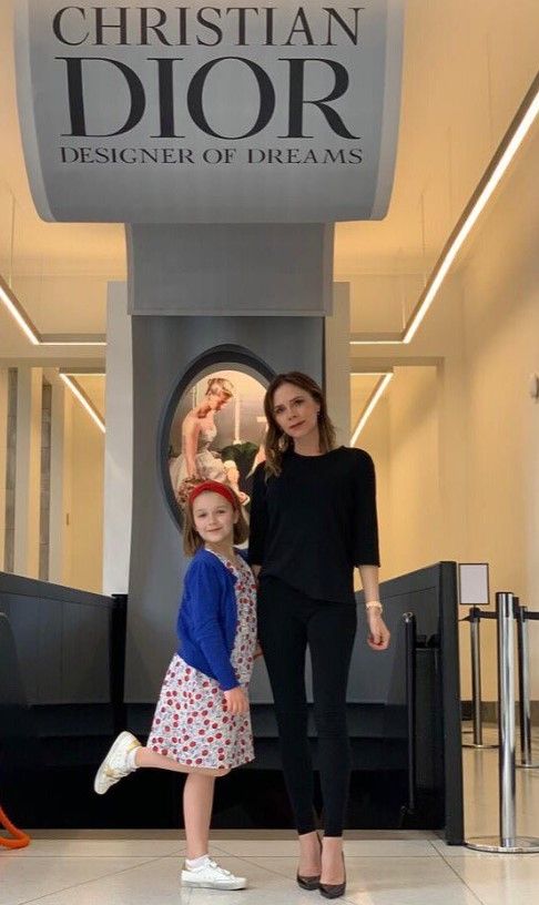 Harper Beckham and Victoria Beckham at the Dior exhibition in 2019