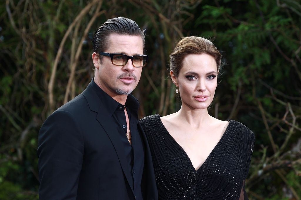 Brad Pitt and Angelina Jolie attended a private reception with Disney costumes and props "malefic" Displayed at Kensington Palace in 2014 in support of Great Ormond Street Hospital