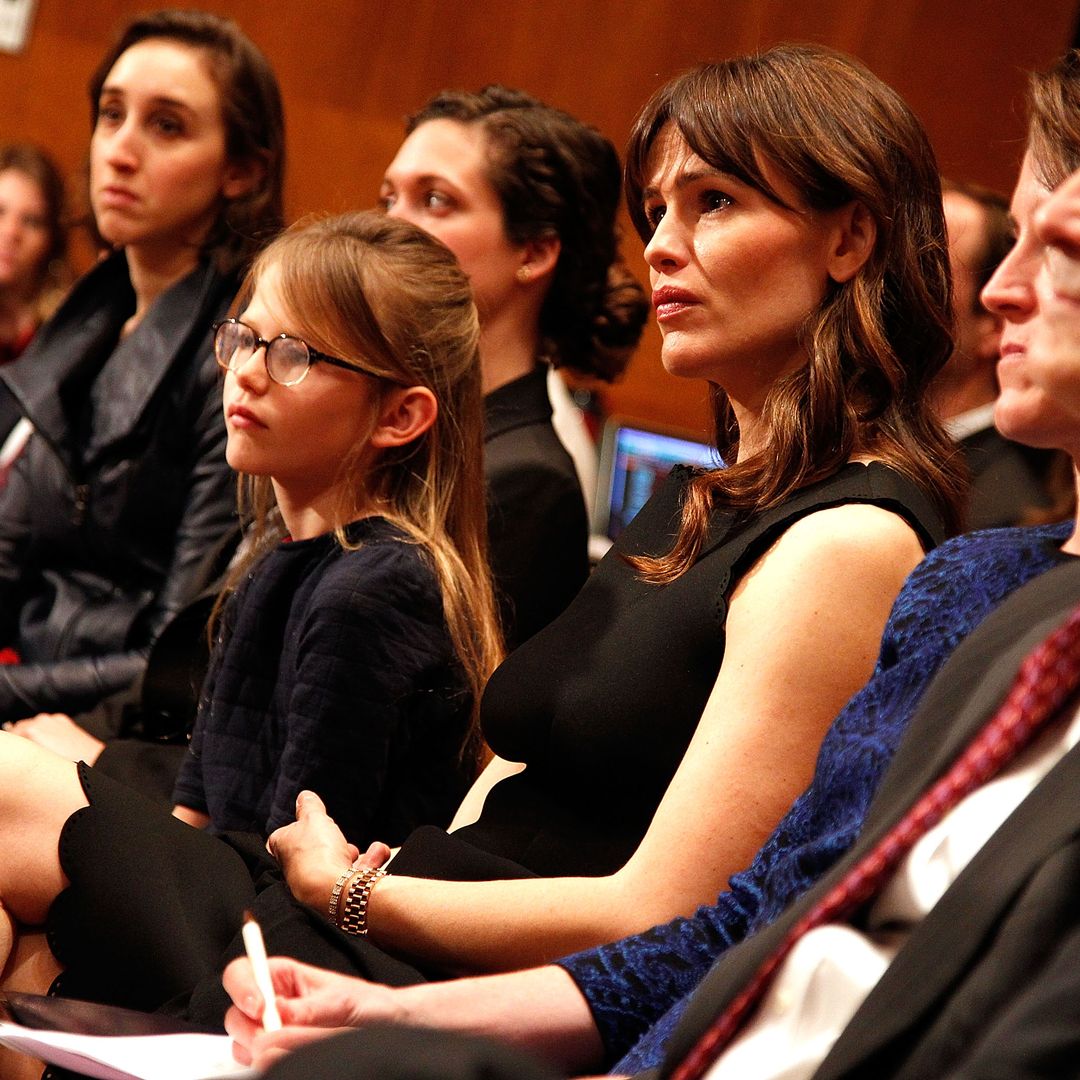 Actress Jennifer Garner (center) and her daughter Violet Affleck listen to Ben Affleck's testimony at a hearing of the Senate Appropriations State, Foreign Operations and Related Programs Subcommittee. "Diplomacy, Development and National Security" On Capitol Hill in Washington on March 26, 2015.