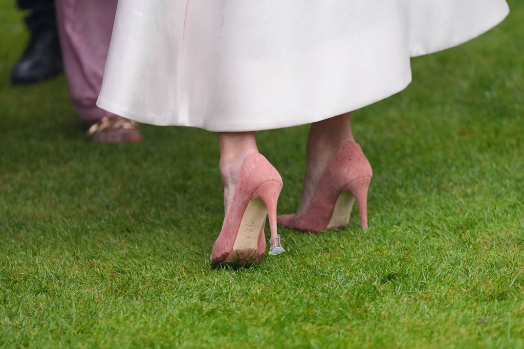     Close-up of Zara Tindall's shoes with heel stoppers at the Sovereign's Garden Party at Buckingham Palace on May 21, 2024 in London, England.