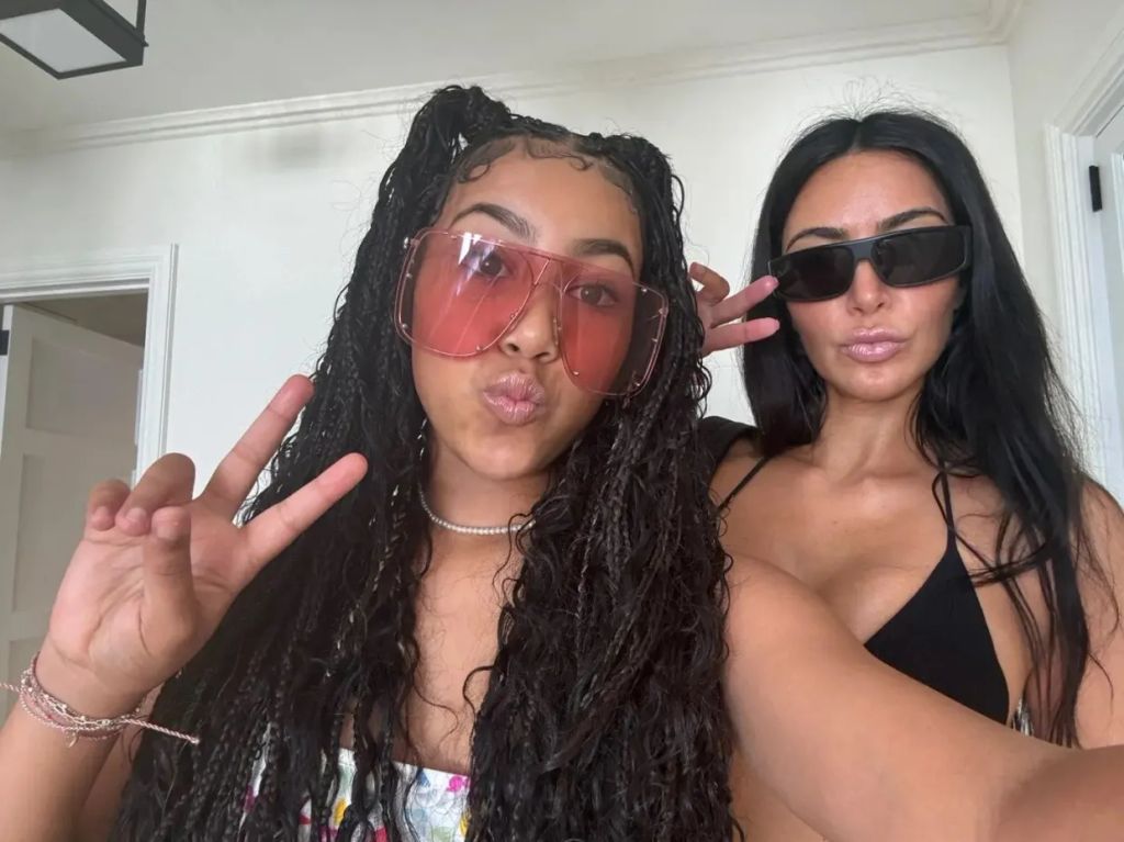 North on vacation with her mother Kim