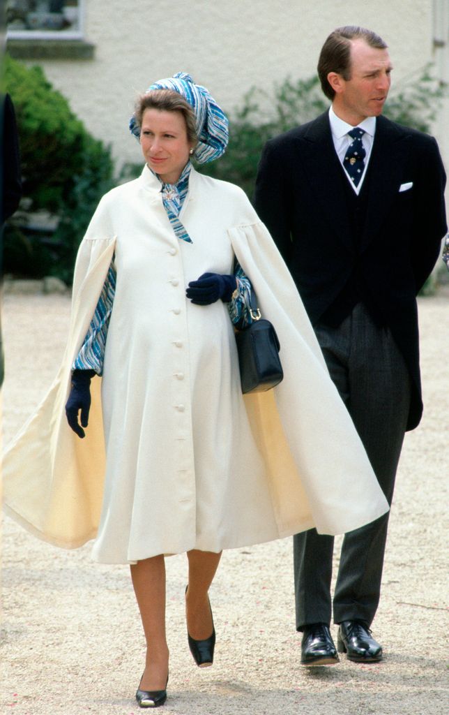 Princess Anne in white coat and blue dress