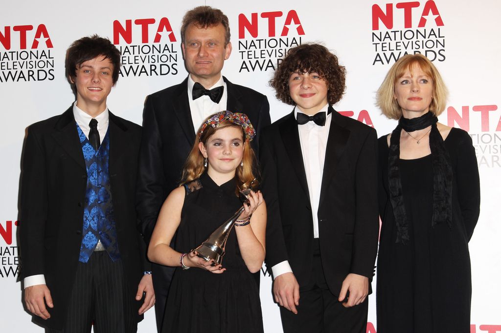Hugh Dennis, Tiger Drew Honey, Ramona Marquez, Danielle Roache and Claire Skinner of Outnumbered pose with their Situation Comedy Award in the National Television Awards 2012 press room at the O2 Arena on January 25, 2012.