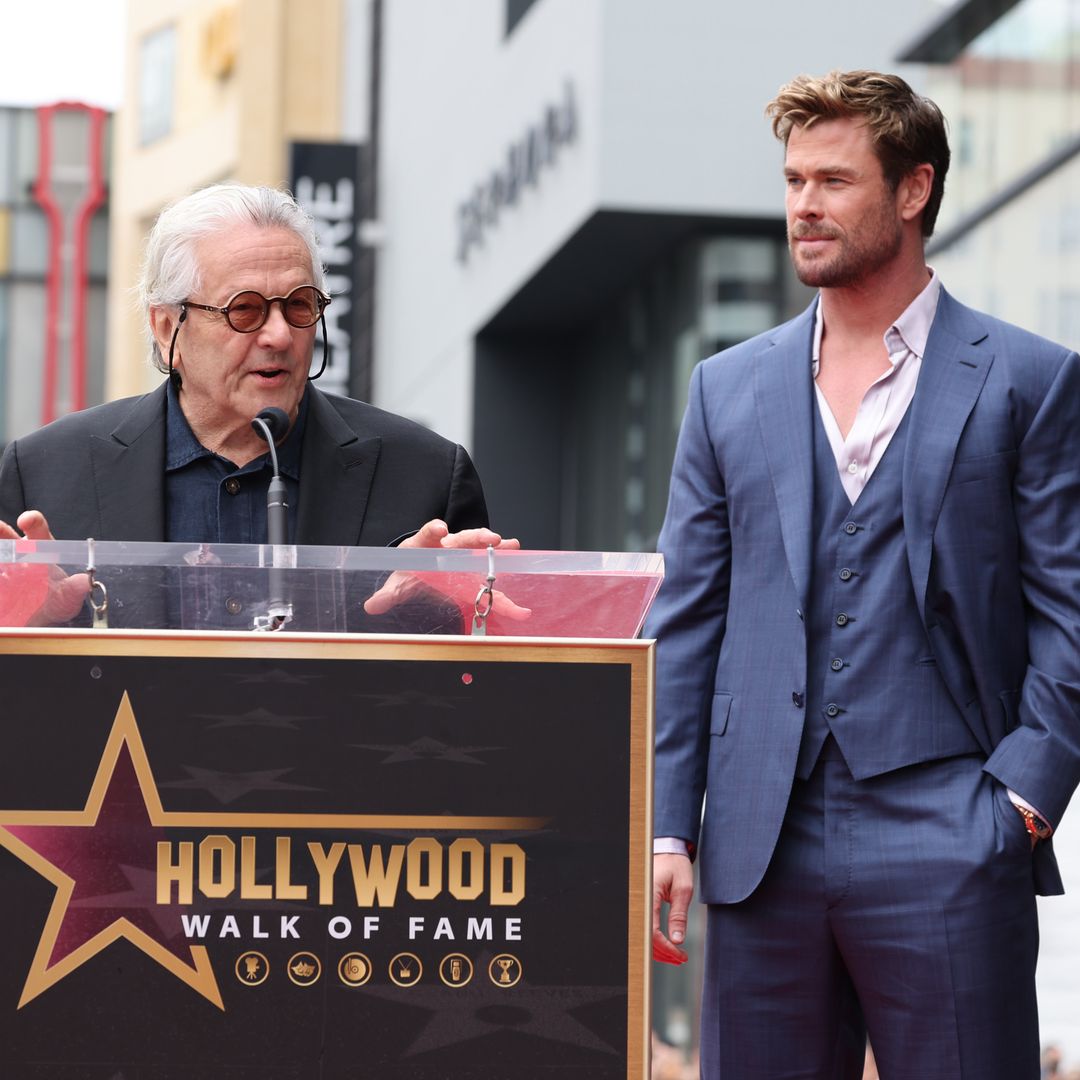 George Miller (left) and Chris Hemsworth are seen at the ceremony honoring Chris Hemsworth with a star on the Hollywood Walk of Fame on May 23, 2024 in Hollywood, California.