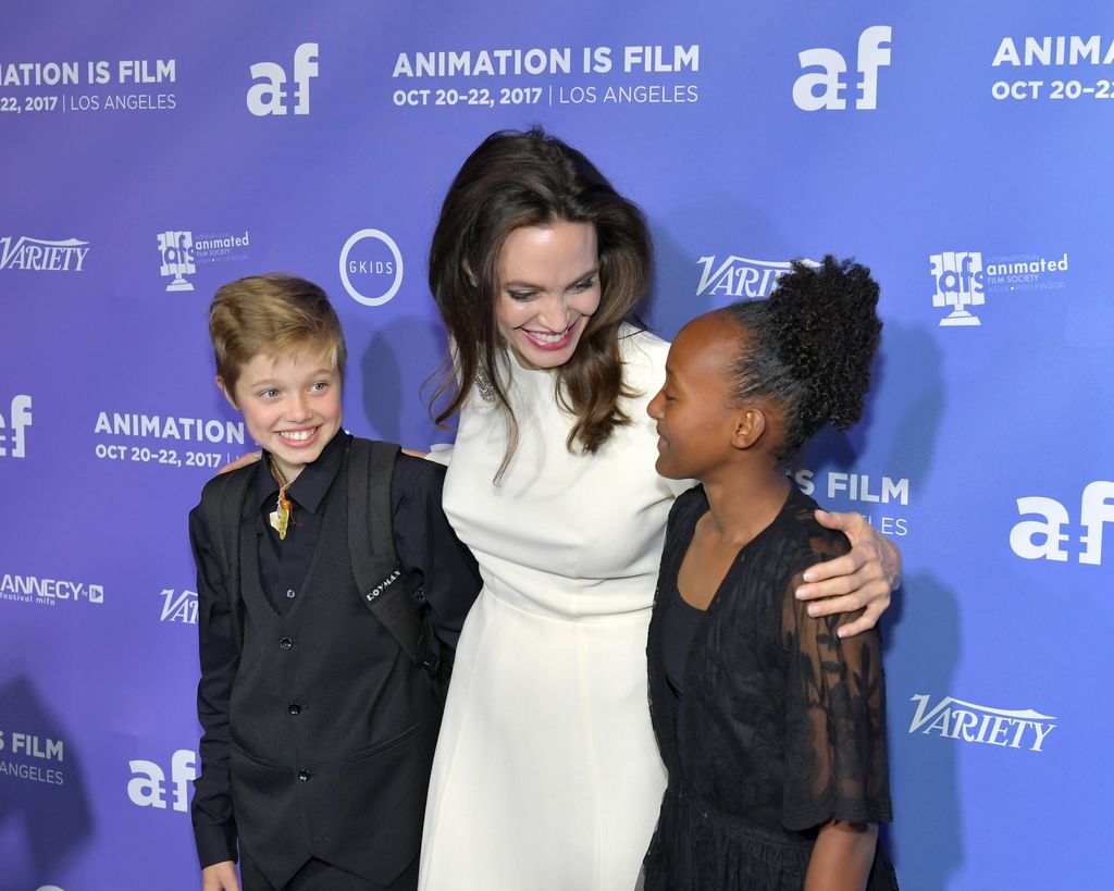 Shiloh Jolie-Pitt, Angelina Jolie and Zahara Jolie-Pitt attend the premiere of GKids "Guardian.No" October 20, 2017 at TCL Chinese 6 Theaters in Hollywood, California