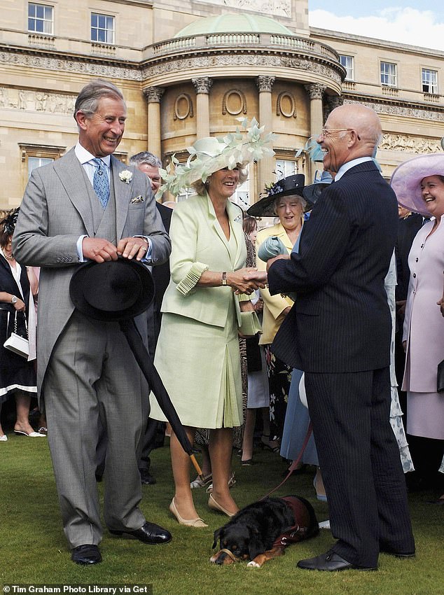 Charles and Camilla speaking to guests Catherine and Tom Broughton at the 2005 Buckingham Palace garden party