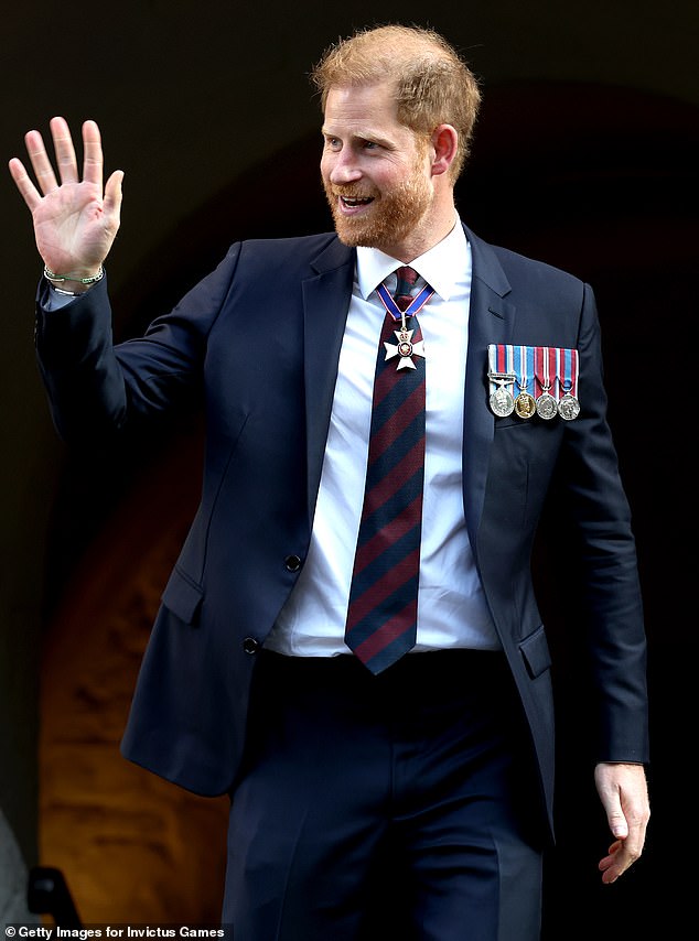 Prince Harry greeted well-wishers outside St Paul's Cathedral in London yesterday