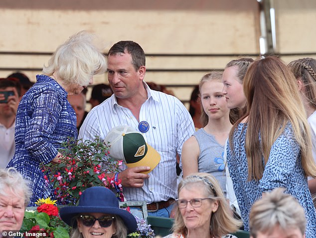 Peter was seen giving the King's wife Queen Camilla a warm welcome at the Badminton Horse Trials