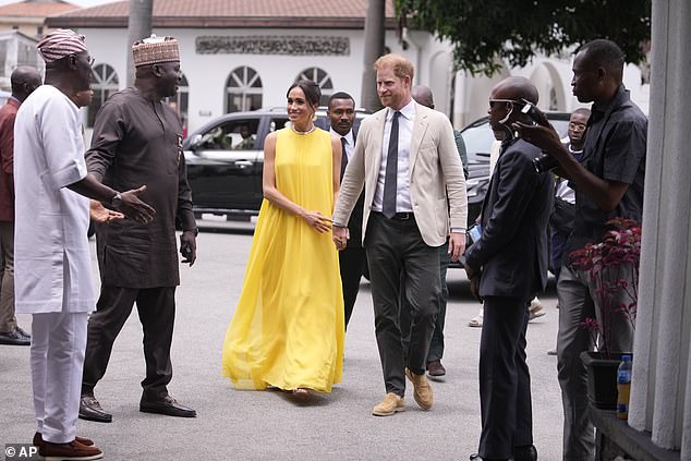 Dressed brightly, Meghan arrived at the Lagos State governor's home in Lagos.