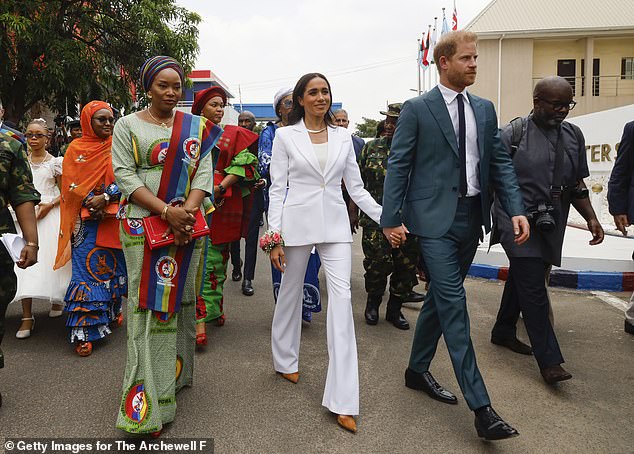Meghan and Harry were a team of colours when they stepped out in colours paying tribute to the Nigerian flag