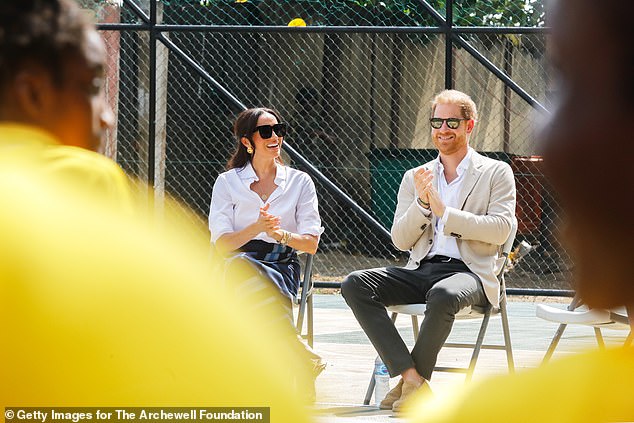 Meghan and Harry on the final day of their Nigerian tour in Lagos - before they jetted back to LA