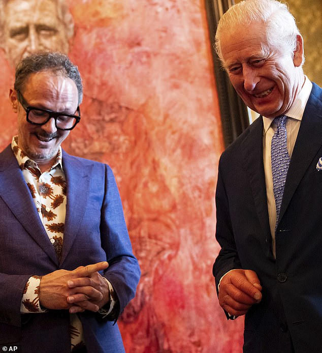 Jonathan Yeo (left) and Britain's King Charles III at the unveiling of Yeo's portrait of the king in the Blue Drawing Room at Buckingham Palace on Tuesday.