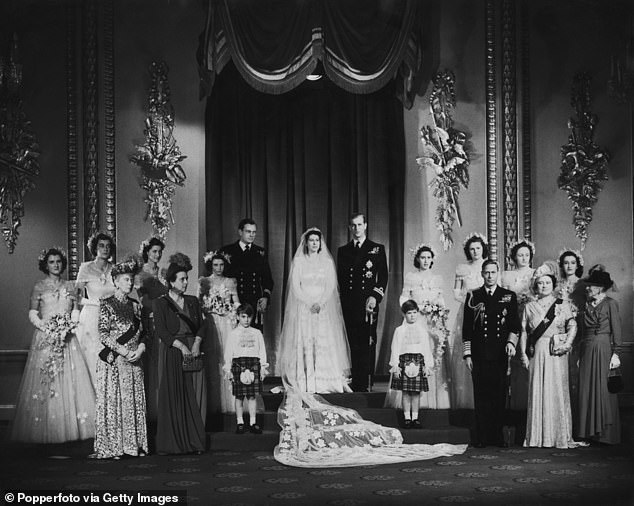 Mary stands on the left of the front row as she attends the wedding of Princess Elizabeth and Phillip in 1947