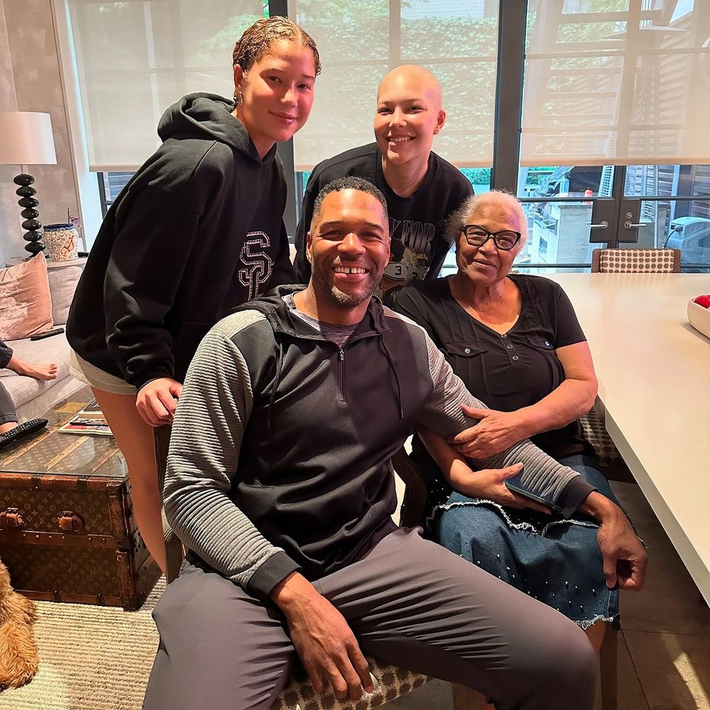 Michael Strahan with his twin daughters Isabella and Sophia and his mother Louise 