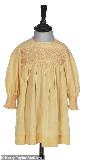 A pale yellow silk gauze dress worn by Princess Elizabeth in 1930