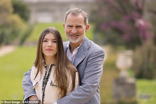 And Crown Princess Sofia is seen in a similar loving pose with King Felipe in the grounds of the vast Madrid estate the family calls home