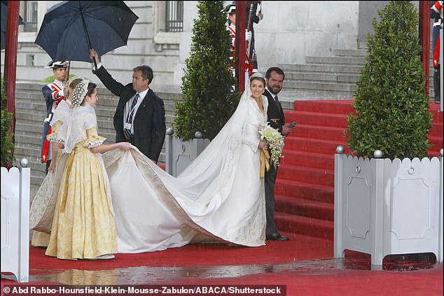 The bride arrived at the cathedral accompanied by her father, Jesus Ortiz. She wore a stunning gown designed by Manuel Pertegaz, which was 15 feet long