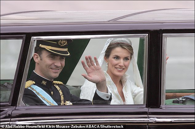 The royal couple looked very happy as they left the cathedral in a Rolls Royce car
