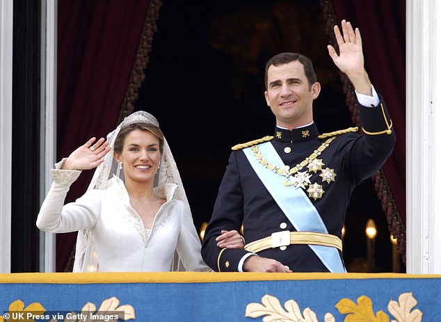 Letizia and Prince Felipe appear on the balcony of the Zarzuela Palace to greet well-wishers