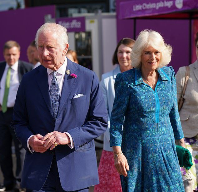 King Charles can’t contain his excitement as he gets new name from group of schoolchildren at Chelsea Flower Show – while Camilla is dubbed ‘Queen of Bees’