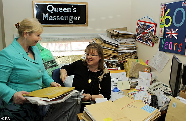 Staff sorting letters sent to Queen Elizabeth II following her Diamond Jubilee in 2012