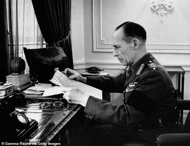 George of Greece working from his office at Claridges in January 1945