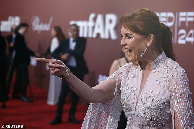 Sarah Ferguson, Duchess of York, poses during a photocall for guest arrivals at the amfAR Gala Cannes 2024