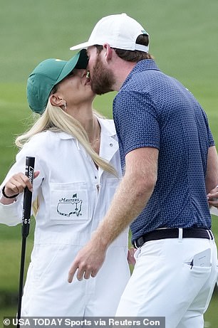 The pair kissed on the grounds of Augusta