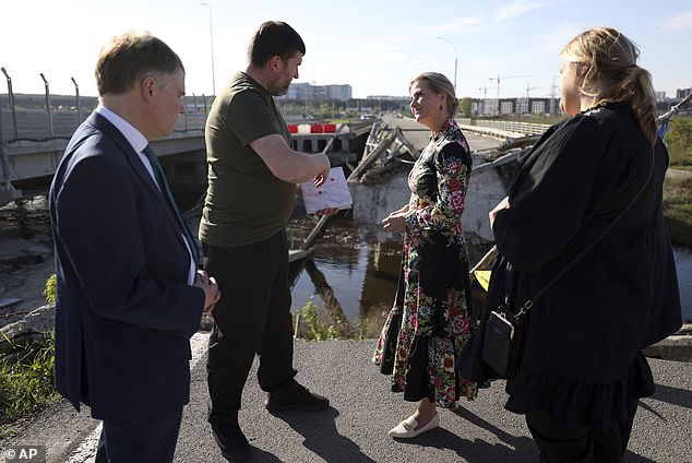 Sophie, Duchess of Edinburgh, and United Kingdom Ambassador to Ukraine Martin Harris, left, visit the Romanivska Bridge in the city of Irpin amid the Russian invasion of Ukraine, Monday, April 29, 2024
