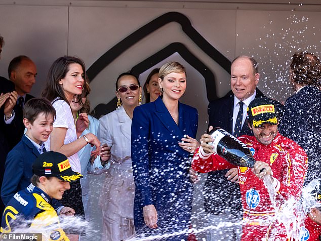 Both Princess Charlene and Prince Albert were beaming as Leclerc sprayed his teammates with the champagne
