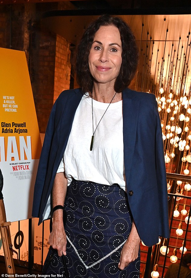 The actress opted for a long skirt that featured a sparkling diamond pattern in a curved print and a simple white t-shirt