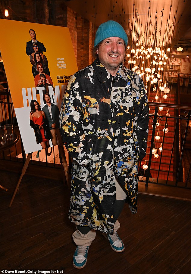 Spider-Man composer Daniel Pemberton went for an unconventional look, consisting of a paint splatter-style coat with high-tops, but he completed the look with a blue beanie.