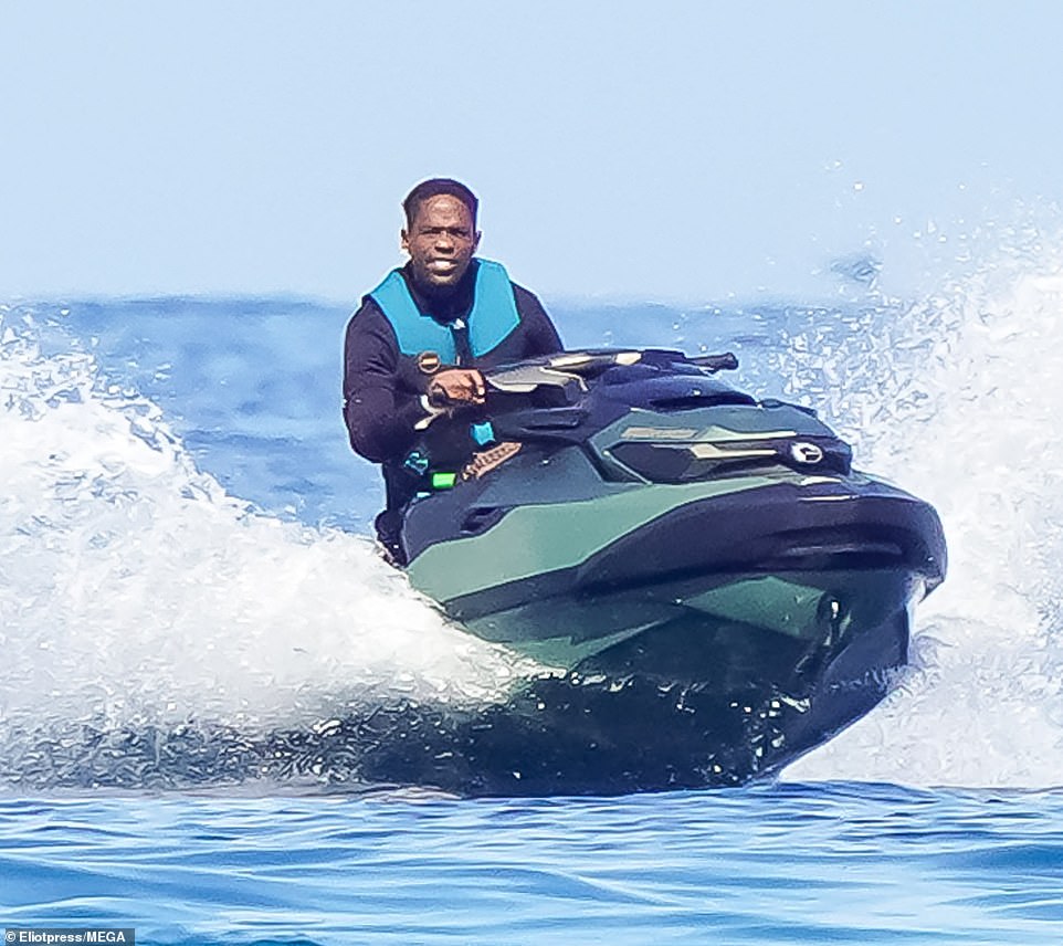 Later, Travis was seen enjoying a little solo jet-skiing session