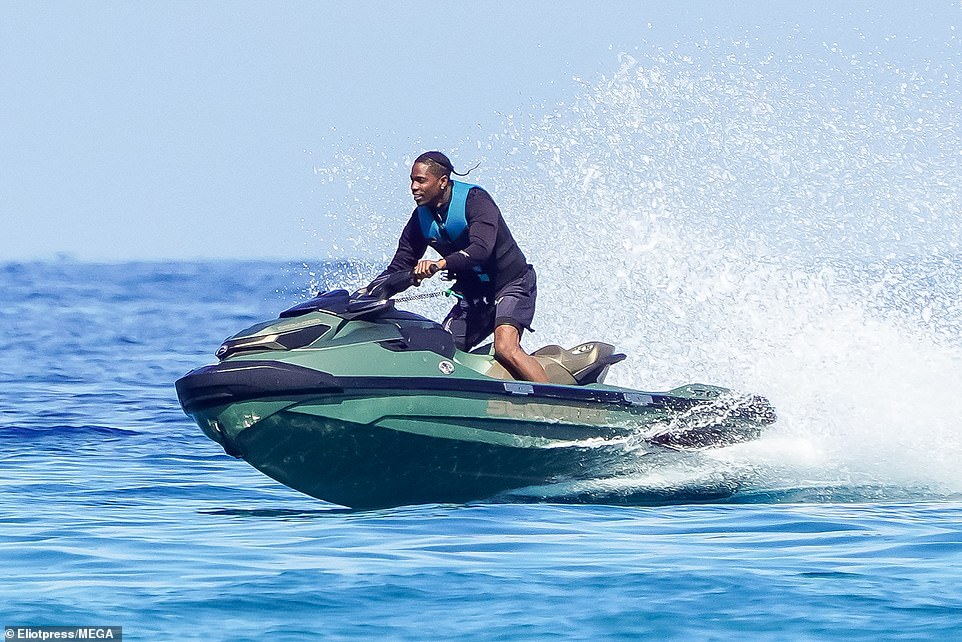 Travis appeared to be carefree and unbothered as he enjoyed some fun in the sun following the brawl he was involved in over the weekend in Cannes