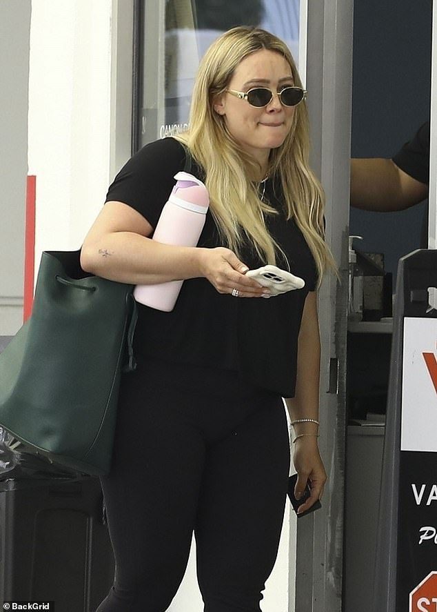 Hilary Duff rocks comfy all-black look as she runs errands solo in LA just three weeks after giving birth to her fourth child