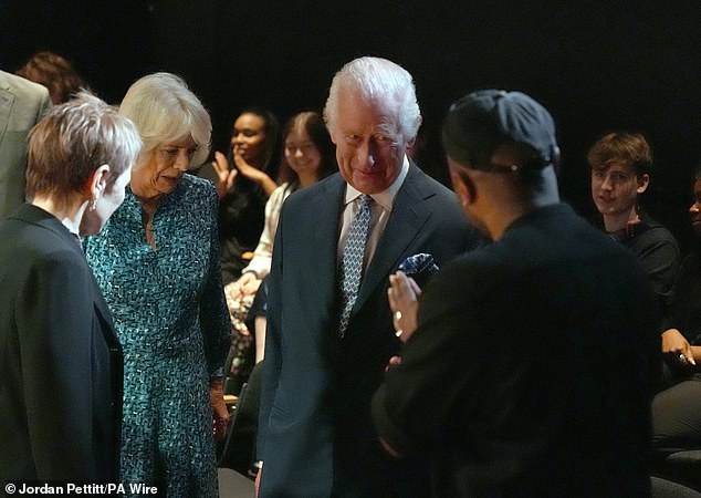 King Charles III speaks to students at the Royal Academy of Dramatic Art in London today