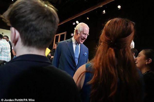 King Charles III speaks to students at the Royal Academy of Dramatic Art in London today