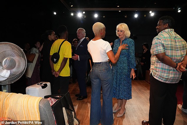 Queen Camilla speaks to students at the Royal Academy of Dramatic Art in London today