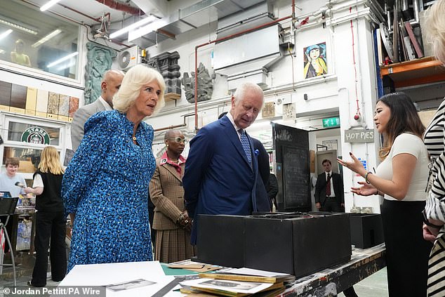 King Charles III and Queen Camilla tour the Scenic Art Studio during a visit to Rada today