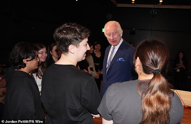 King Charles III speaks to students at the Royal Academy of Dramatic Art in London today