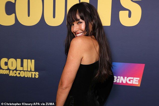 The Home and Away star showed off her toned legs in a one-shoulder black velvet mini dress and smiled on the red carpet