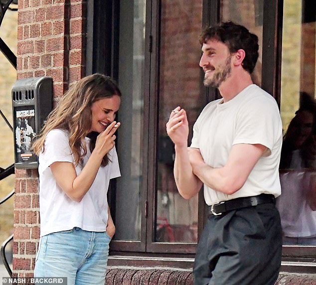 Newly-single Natalie Portman, 42, looks giddy with Paul Mescal, 28, as they get the giggles while enjoying a smoke outside a London bar… weeks after finalising divorce from Benjamin Millepied amid affair rumours