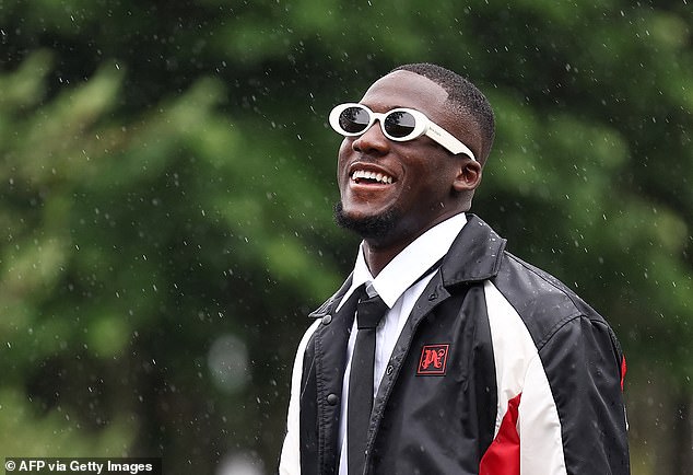 Liverpool's Ibrahima Konate also opted for a stylish look by adding some sunglasses to his outfit.