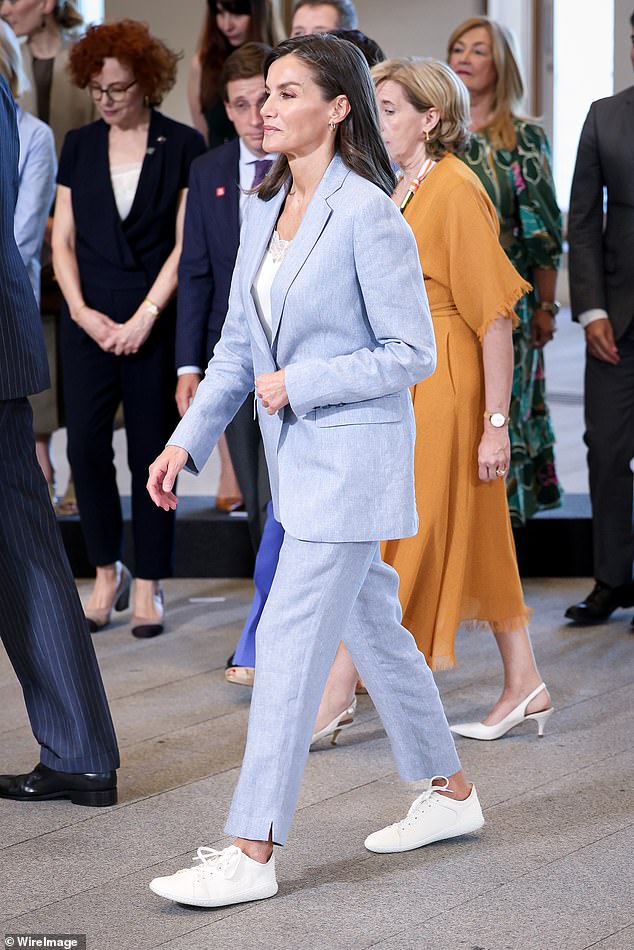 Queen Letizia appeared in good spirits as she got to work after the bombshell book claims