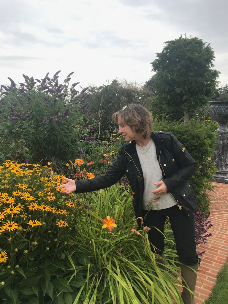 Rebecca Pow MP inspecting the garden