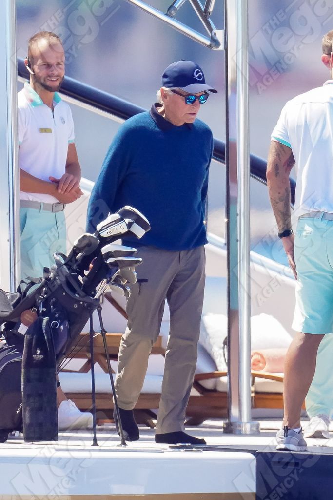 Michael Douglas took a helicopter to his yacht to play a round of golf before returning to enjoy the thrills of the Monaco Grand Prix