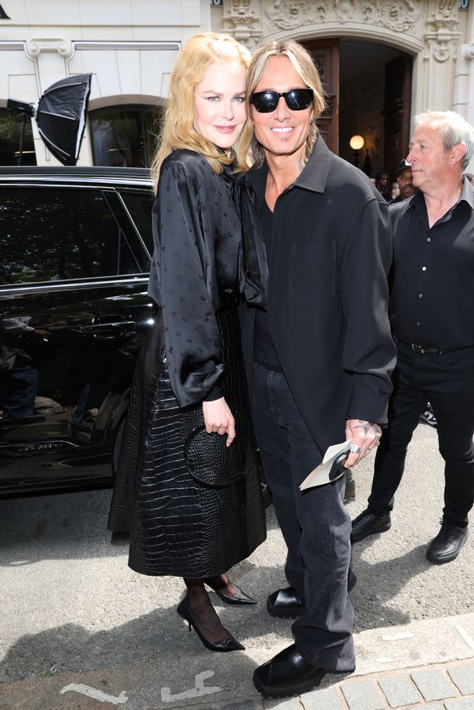Nicole Kidman poses outside with Keith Urban