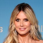 Heidi Klum is bikini ‘ready’ as she lounges in tiny two-piece during glorious getaway