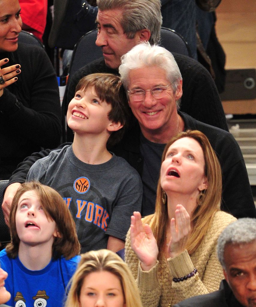 Homer with his father, Richard Gere, at a 2012 basketball game
