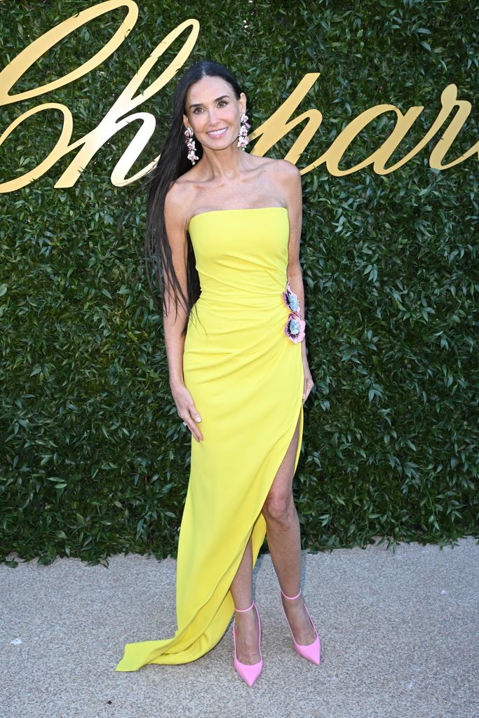Demi Moore in a yellow gown